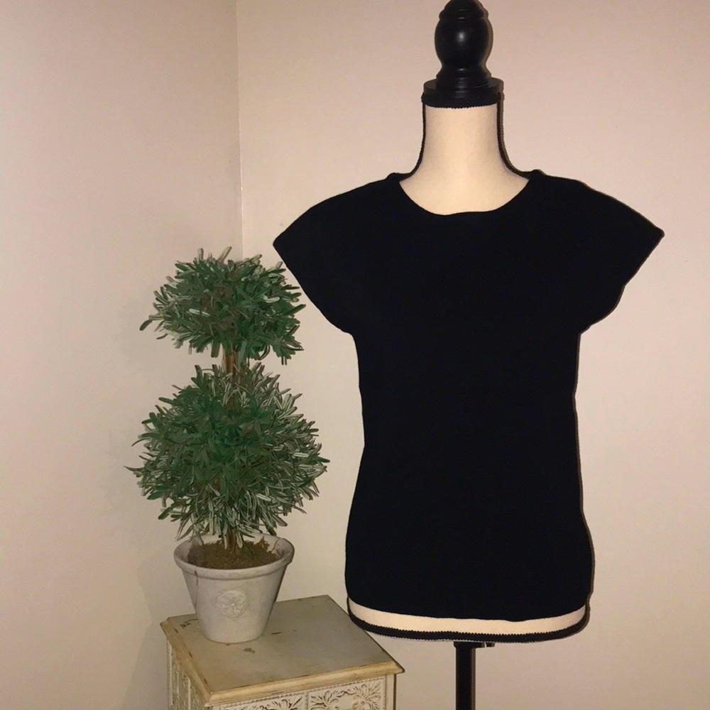 PHILOSOPHY black sleeveless blouse.